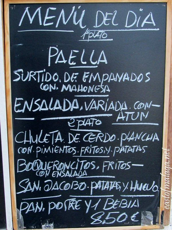 Pizarra con menú del día y precios en Teruel